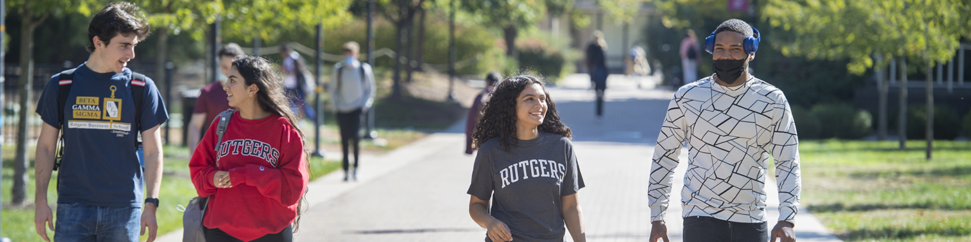 Rutgers students walking on Livingston campus